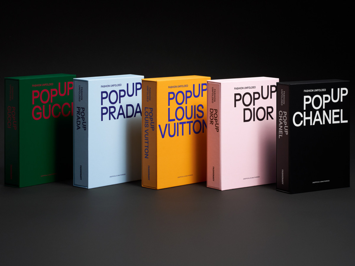 Five colorful Fashion Unfolded pop-up book slipcases.
