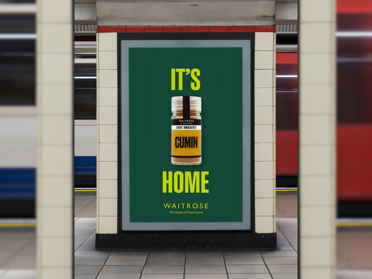 Waitrose "It's cumin home" ad in a subway station.