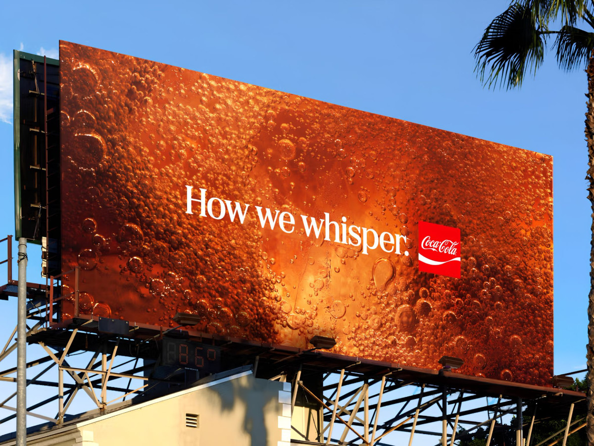 Billboard featuring a macro shot of carbonated cola.