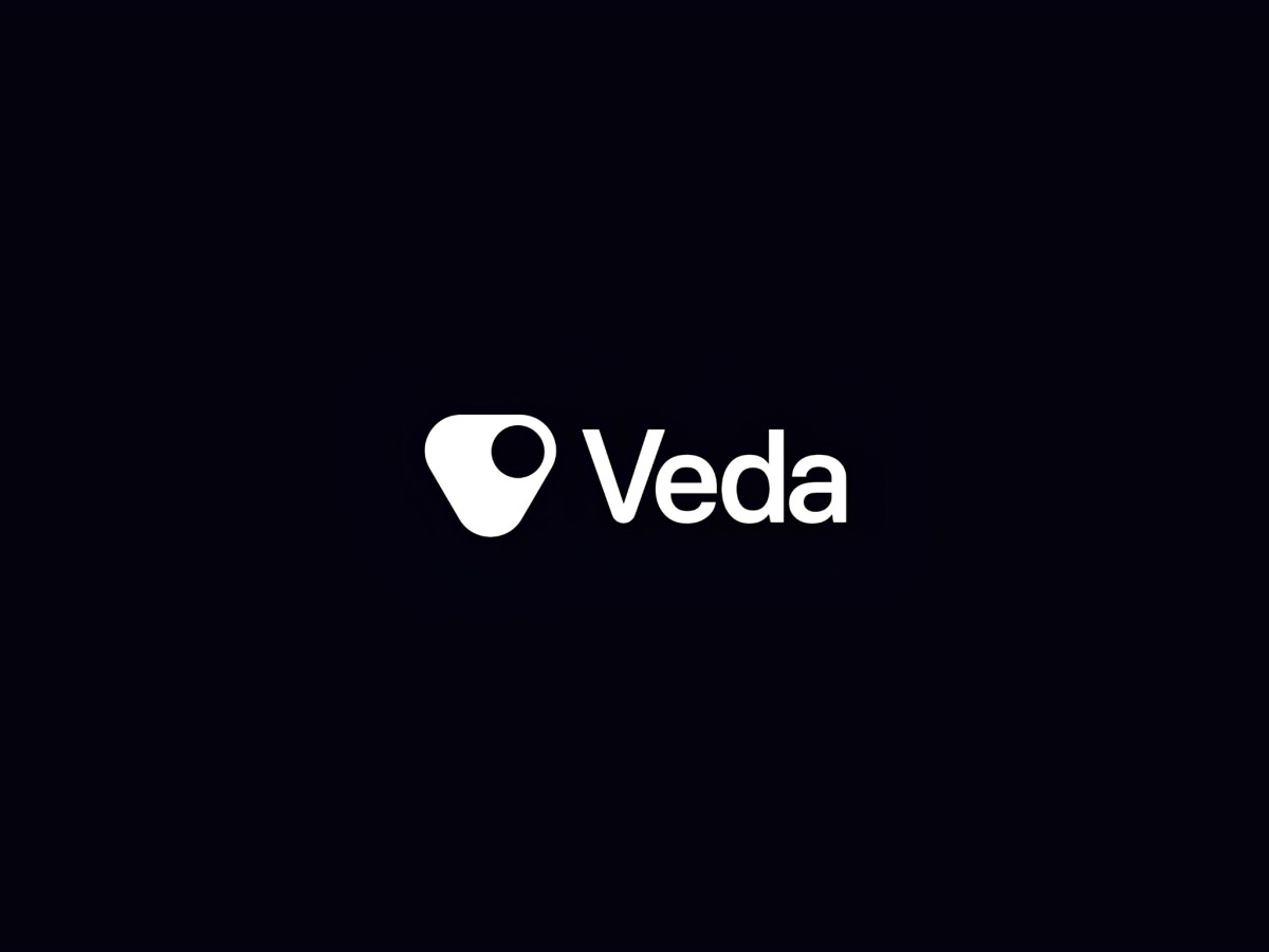 White Veda logo and wordmark on black.