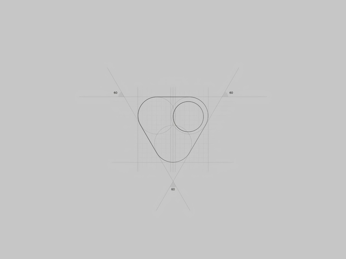 Geometric construction lines of the Veda logo.