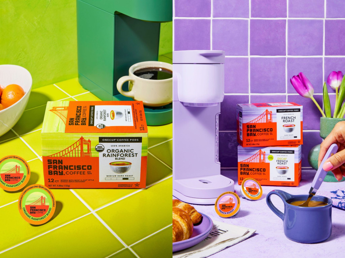 Colorful San Francisco Bay Coffee pod boxes on counters.