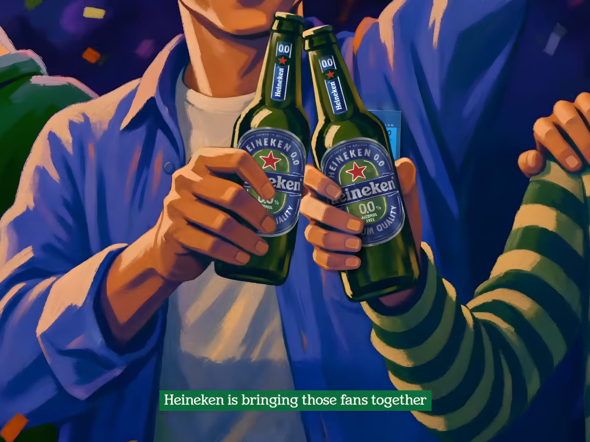 Two people clinking Heineken 0.0 bottles.