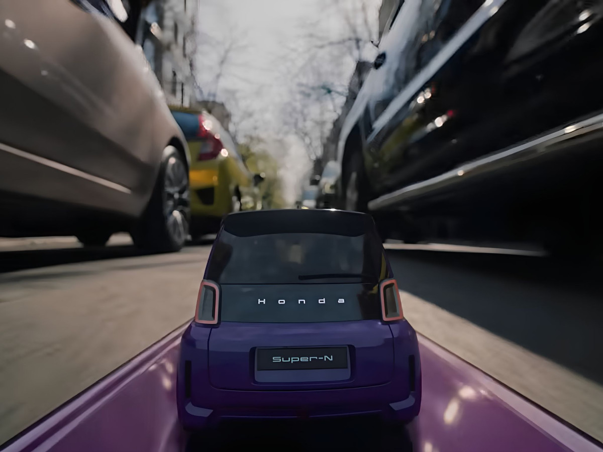 Honda Super-N EV driving through a city street.
