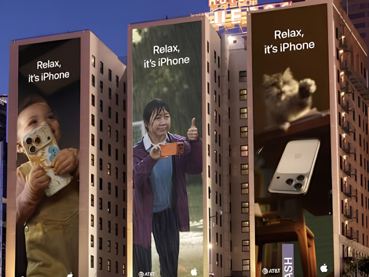 Three tall building billboards for the "Relax, it's iPhone" campaign.
