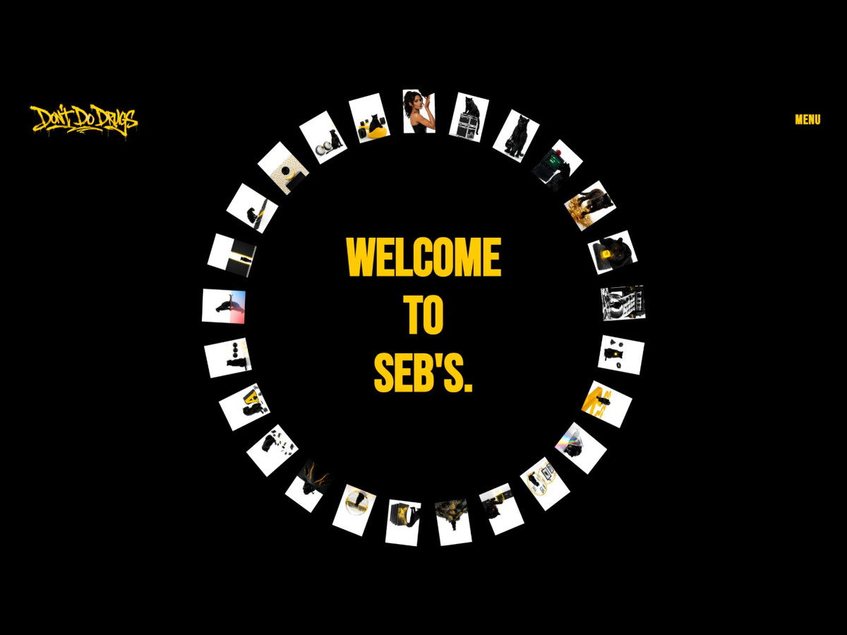 Black website displaying "Welcome to Seb's" inside photo ring.