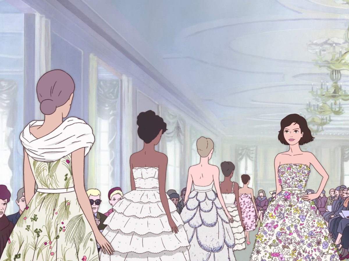 Models wearing floral Dior gowns.