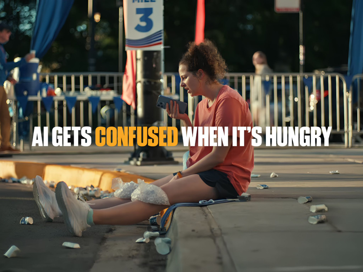 Digital screen displaying the Snickers Hungr.AI campaign interface and prompt responses.