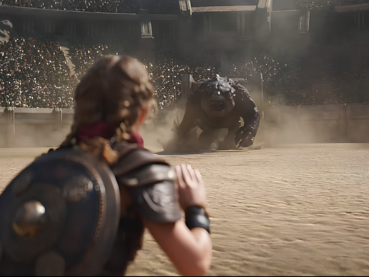 Young girl warrior facing a beast in an arena.