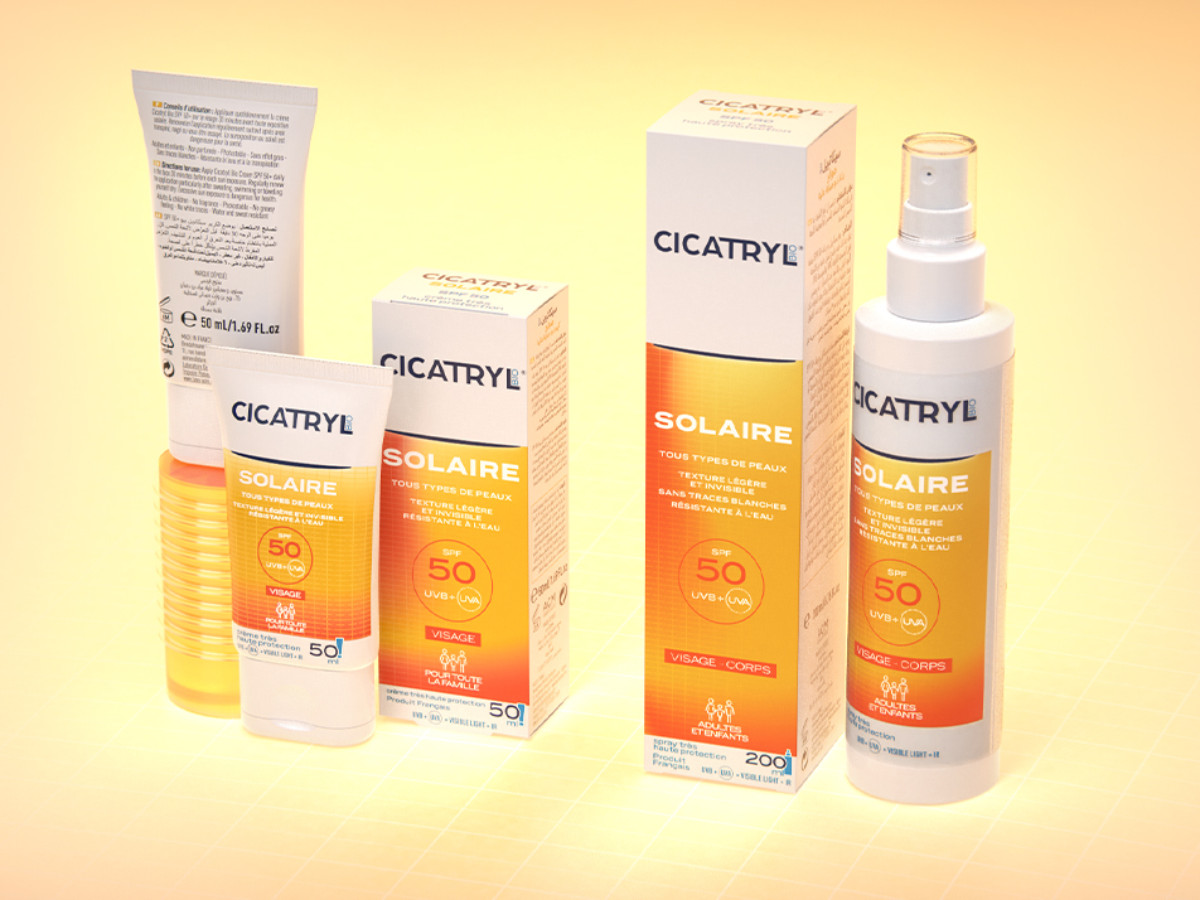 Bright yellow-orange sunburst gradient makes the SPF 50 sun care line easy to spot.