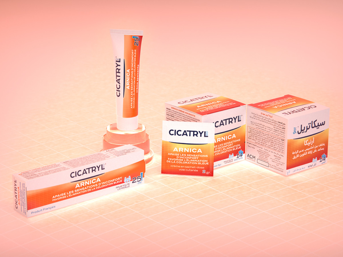 Warm coral-orange gradient sets the Arnica tube and cartons apart from the rest of the range.