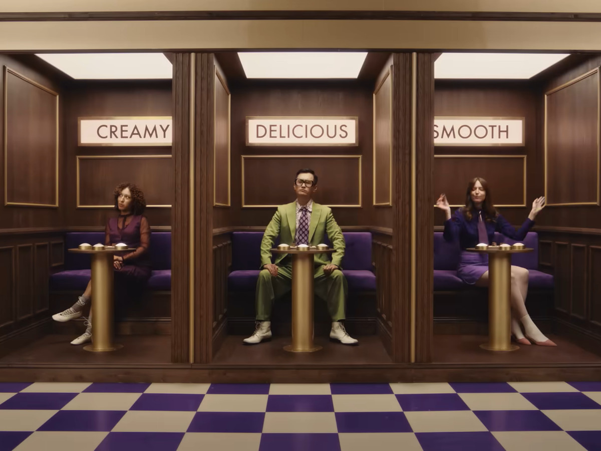 Cadbury employees testing caramel in the fictional department.