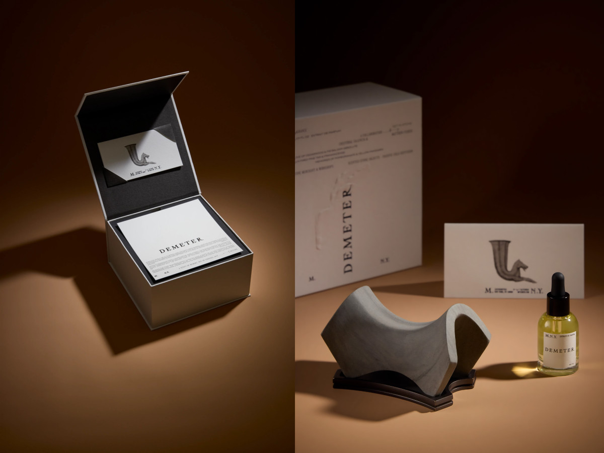 Demeter packaging box, sculptural diffuser, and yellow essence bottle.