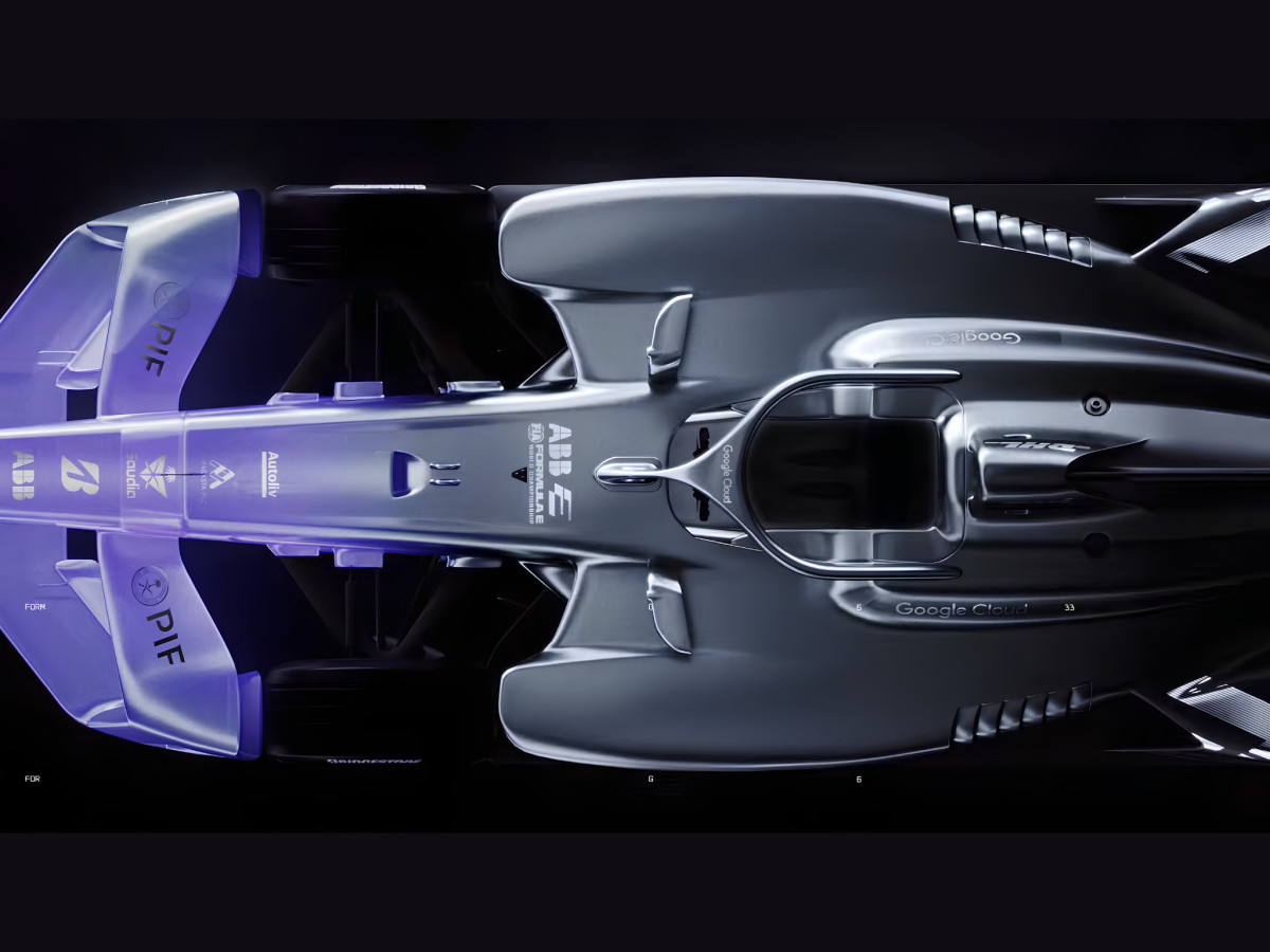 Overhead view of a silver and purple Formula E car.