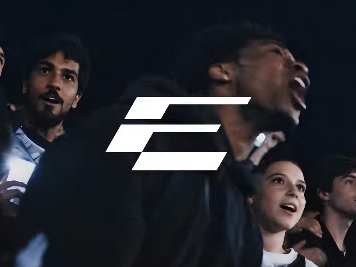 New Formula E logo displayed over a cheering crowd.