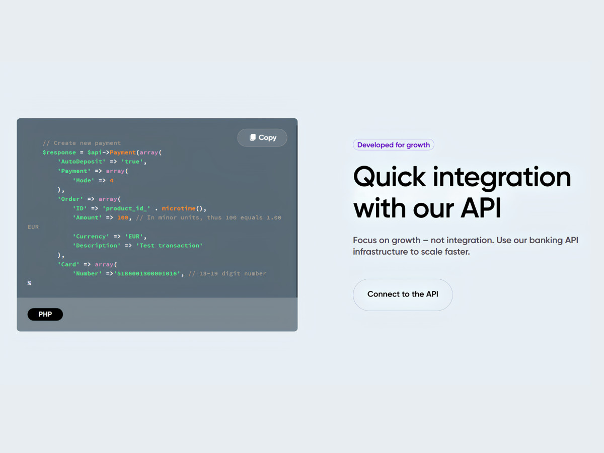 Webpage section displaying a copyable PHP API code snippet.
