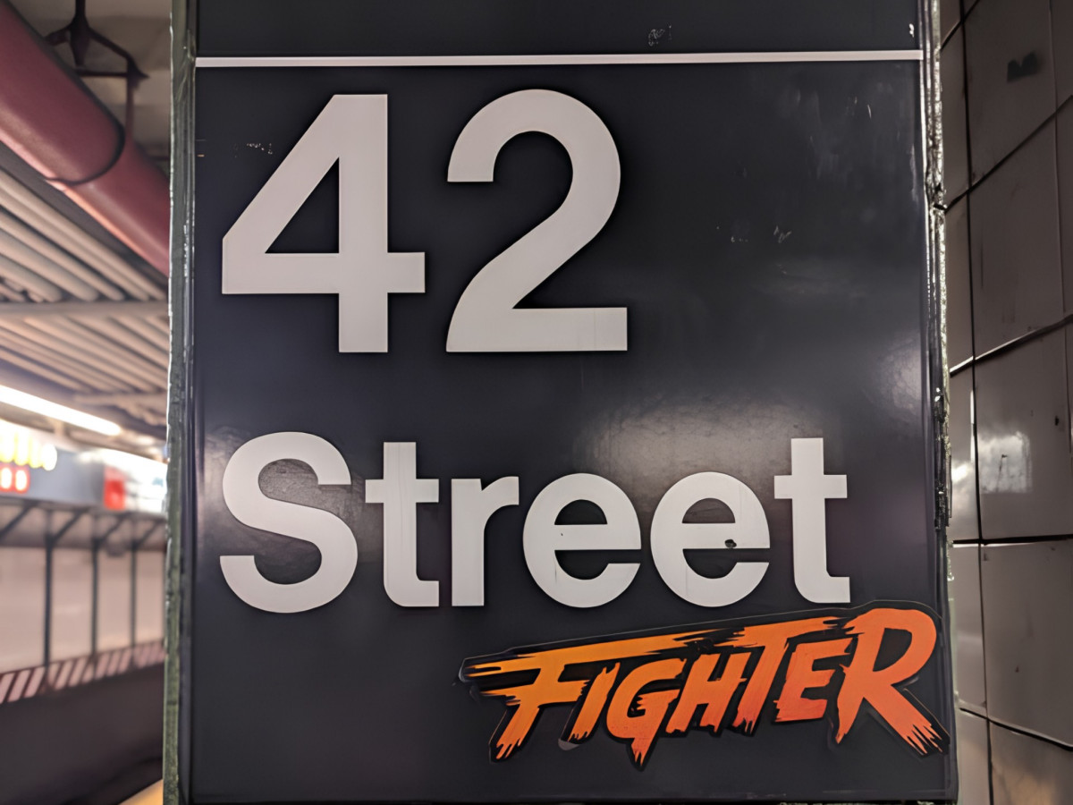 42 Street subway sign modified with orange Fighter logo.