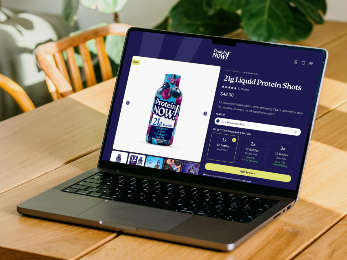 Laptop showing the Blueberry Acai desktop product page.