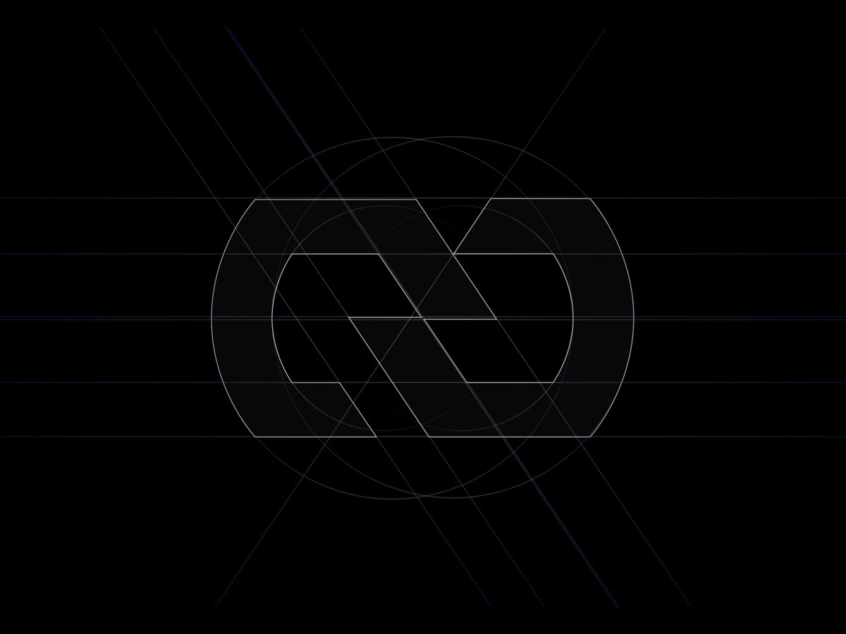 Geometric grid construction of the interlocking HEXA logomark.