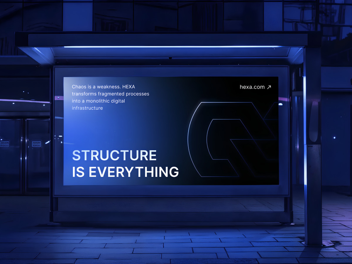 Bus shelter billboard displaying HEXA branding and slogan.