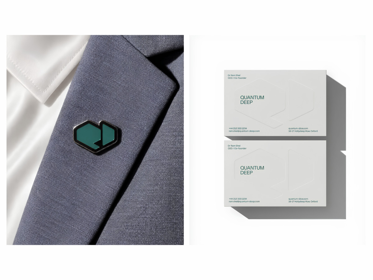Quantum Deep lapel pin and branded white business cards.