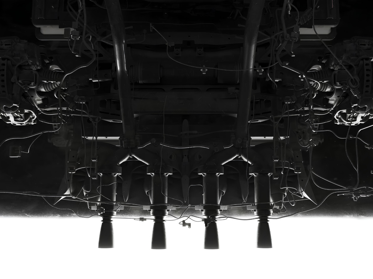 Monochromatic view of vehicle mechanical thruster assembly.