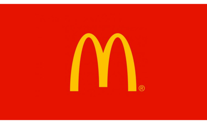 Mcdonald's logo design svg on red background.