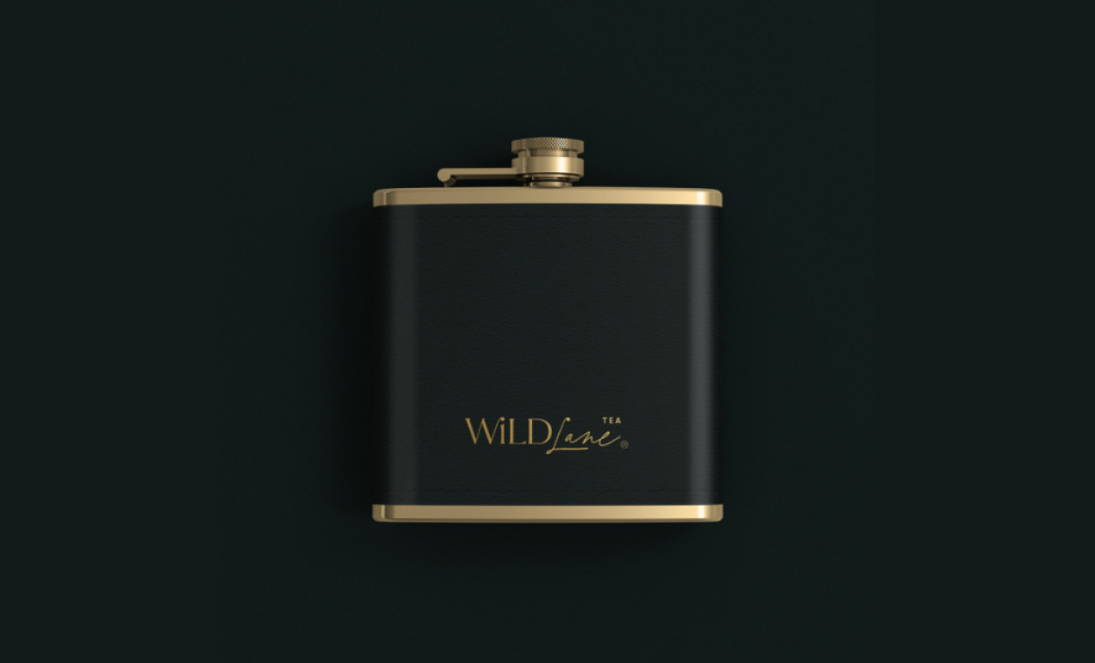 Matte black flask featuring 'Wildlane Tea' logo by TL Design Co.