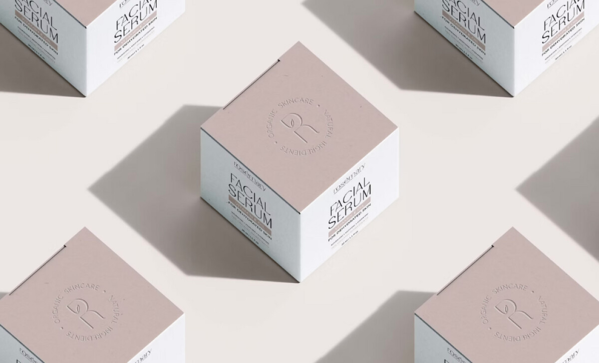 Fiore branded facial serum boxes with monogram emboss and soft shadows.