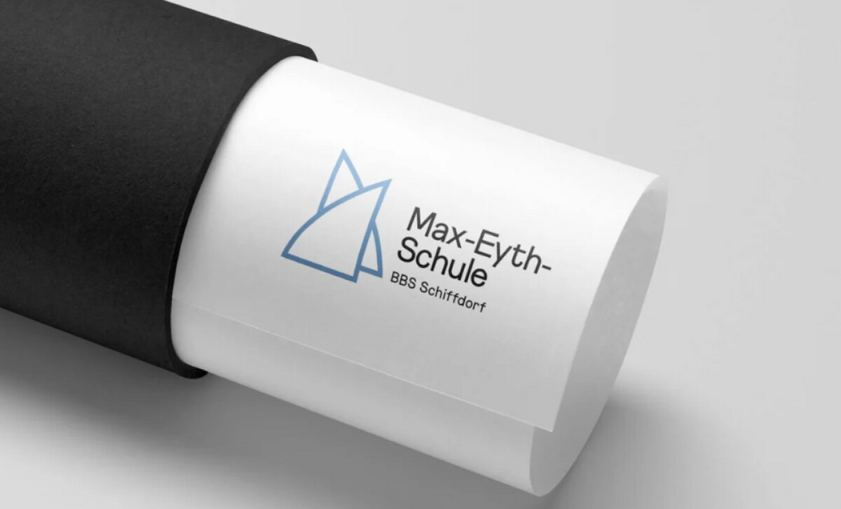 Max-Eyth-Schule BBS Schiffdorf logo on a rolled paper design by Kreativbüro Zwei.