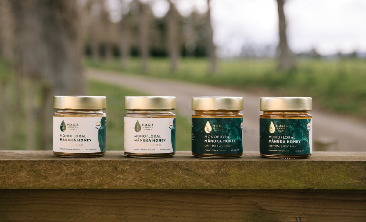 Four glass jars of Hana Monofloral Mānuka Honey by Jess Wilson Design.