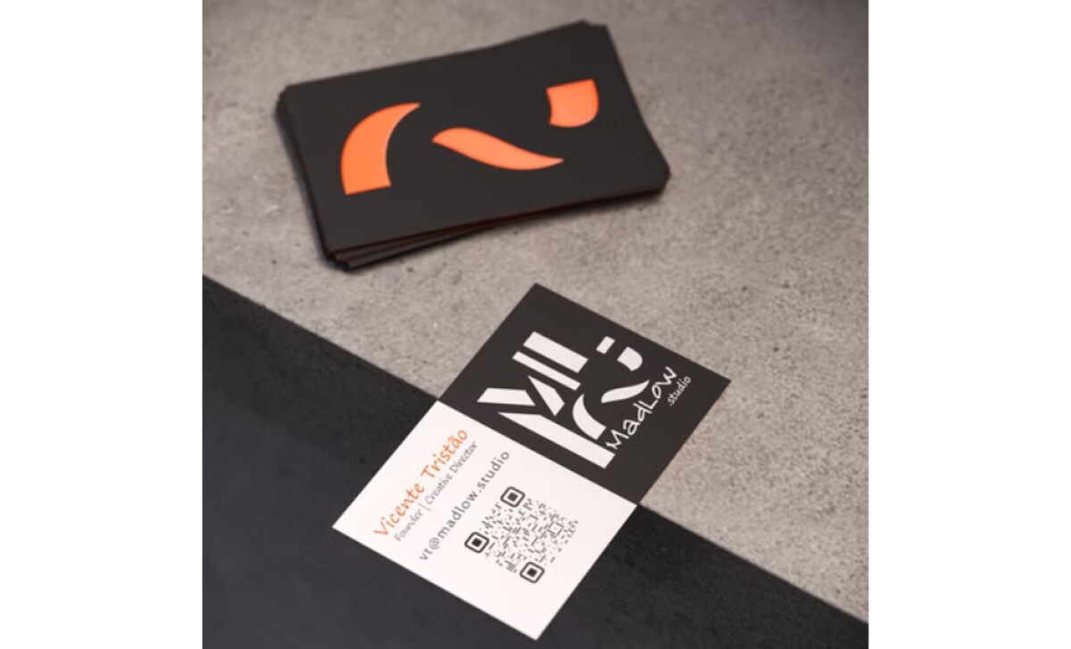 MadLow Studio business card showing both the front and back designs
