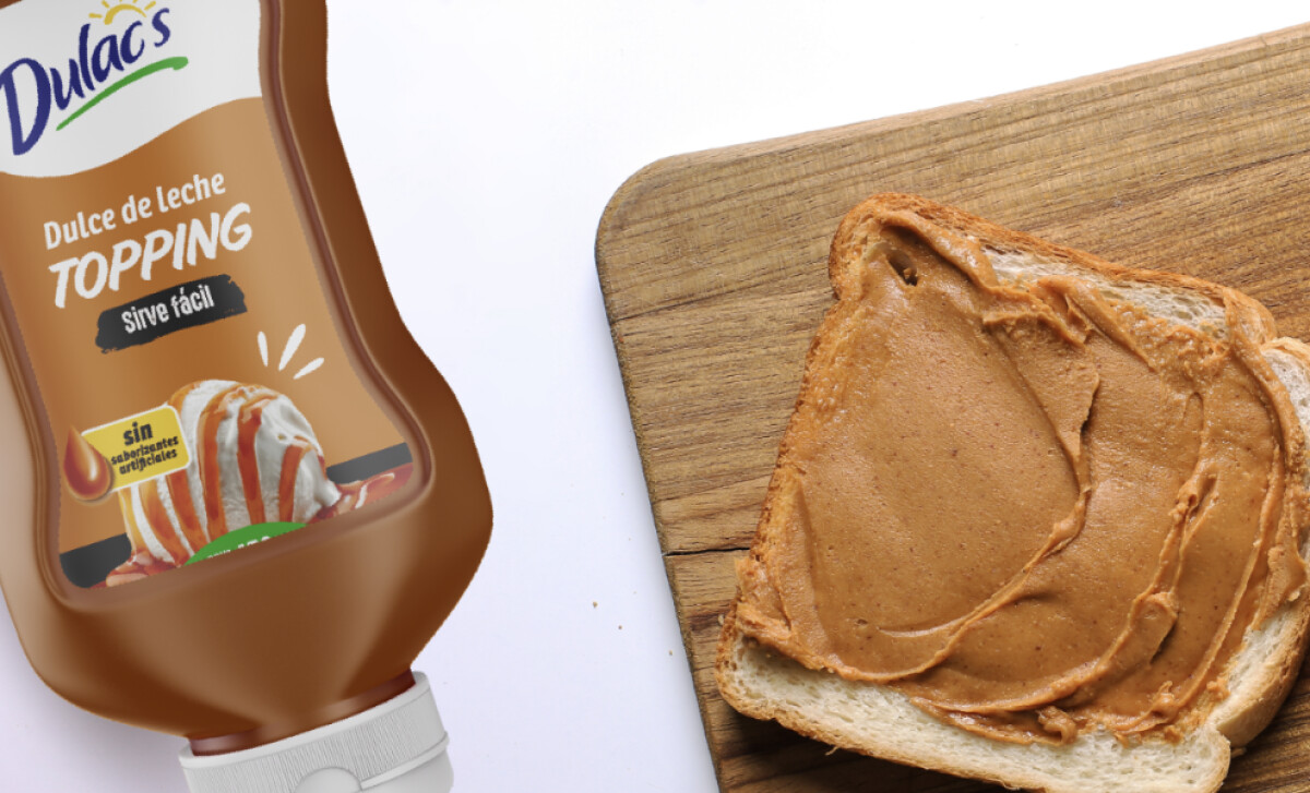 Café Frío Dulacs Dulacs Dulce de Leche bottle next to a slice of toast by Skedio.