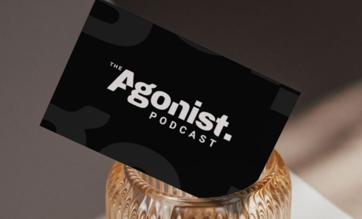 The Agonist logo on a black card by Omnibrand Ltd.