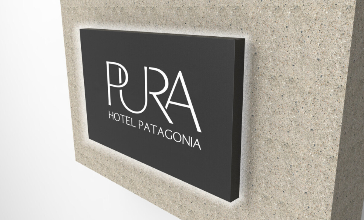 PURA Hotel Patagonia wall sign in modern minimalist design.
