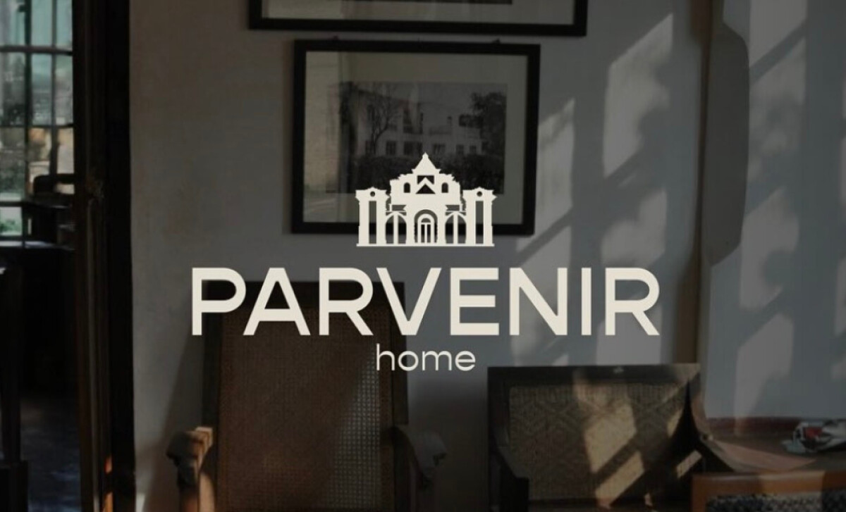 Parvenir Home logo in white with architectural symbol over interior background.
