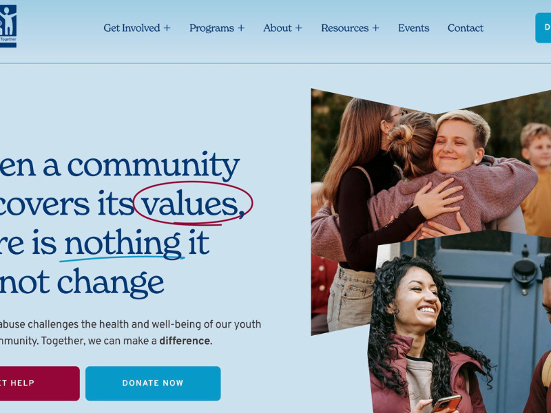 SAFE organization homepage with community values message and images of people smiling and hugging