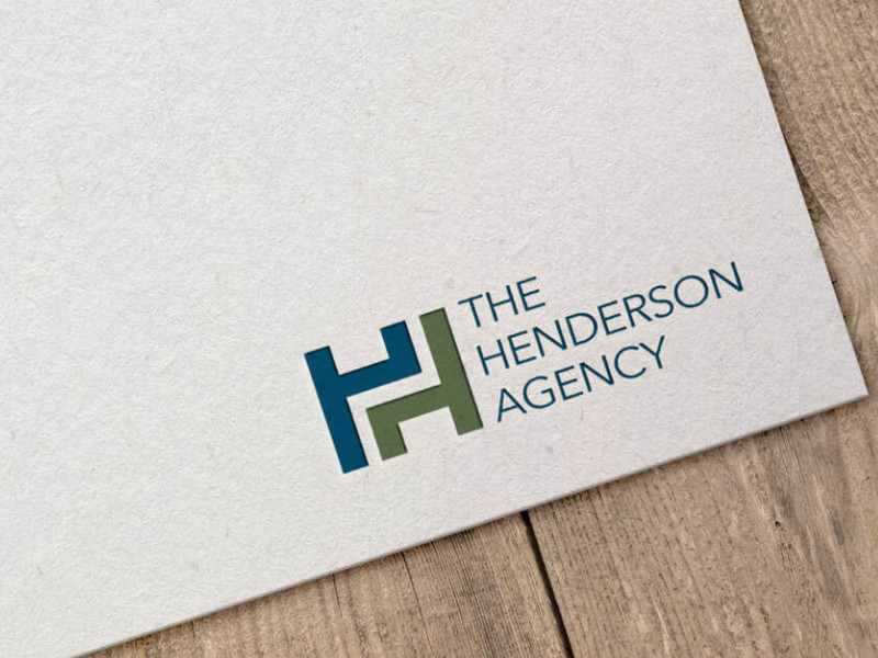 The Henderson Agency logo design by Perched Owl.