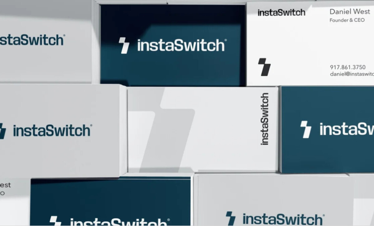Assortment of instaSwitch branded business cards by Will Han Design.