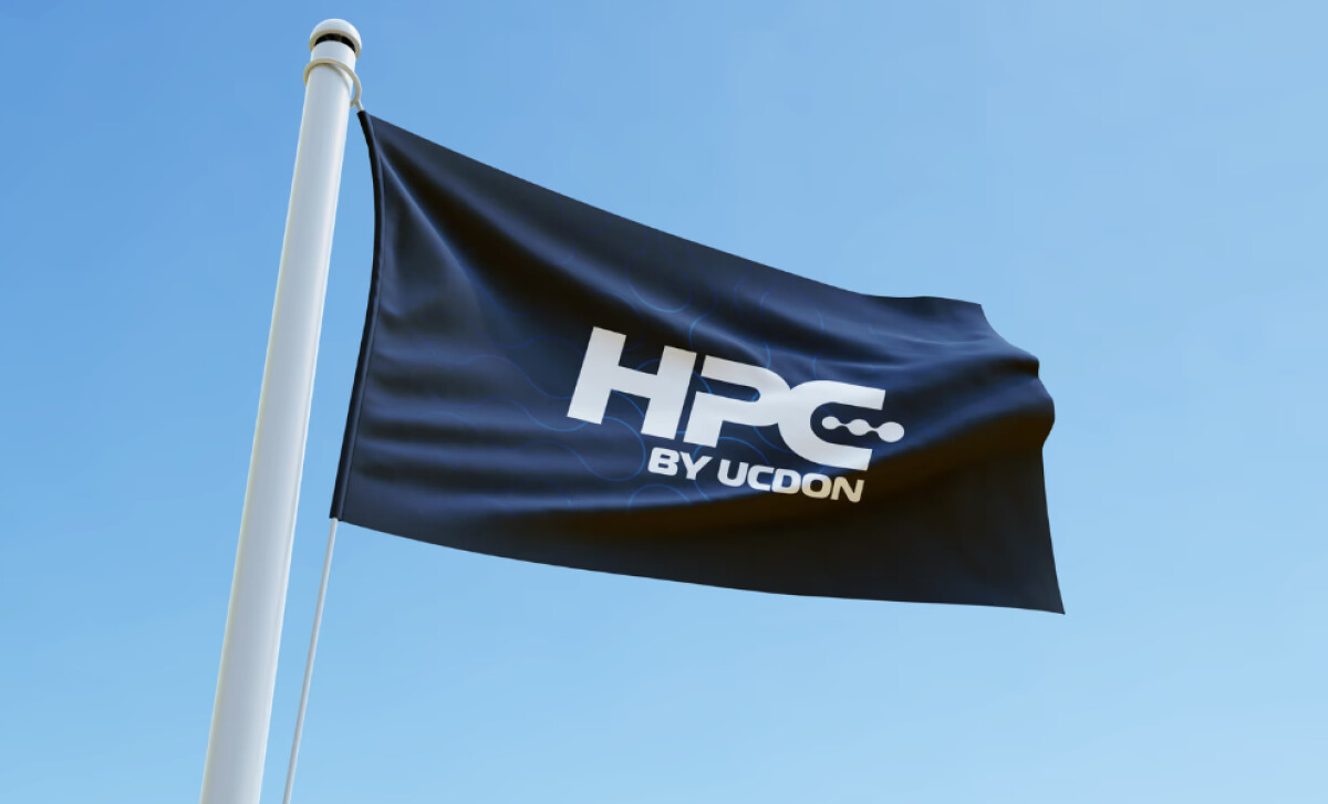 A black flag with the white "HPC BY UCDON" design by Tive.