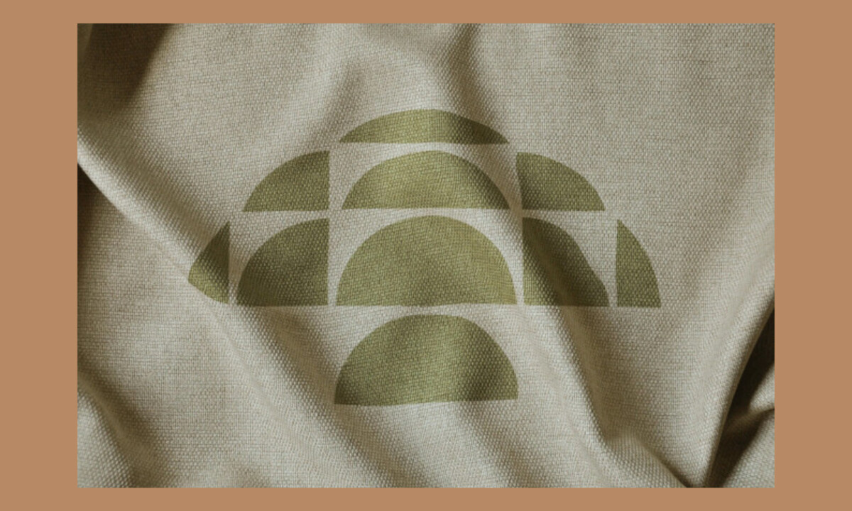 Symbol mark applied across textured fabric