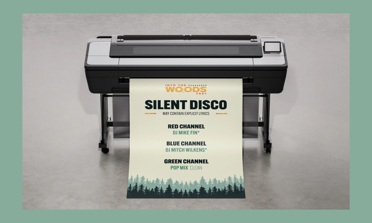 Branded festival tent with Into the Woods Fest graphics