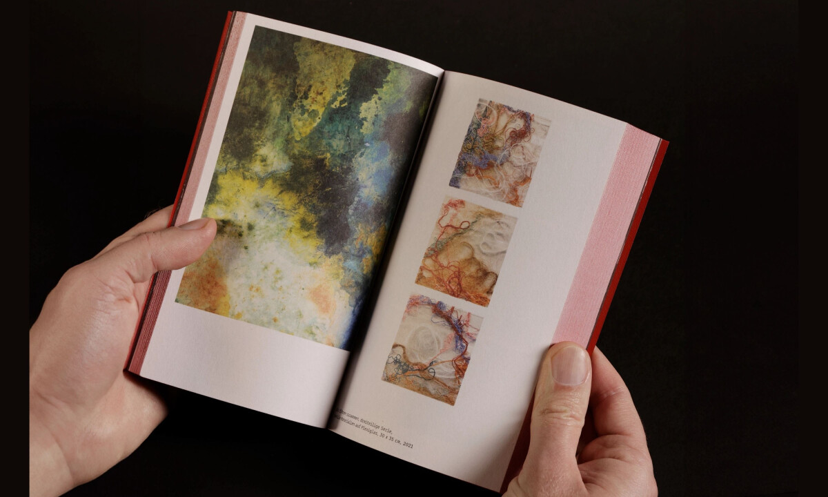 Editorial layout showcases diverse artwork across structured spreads