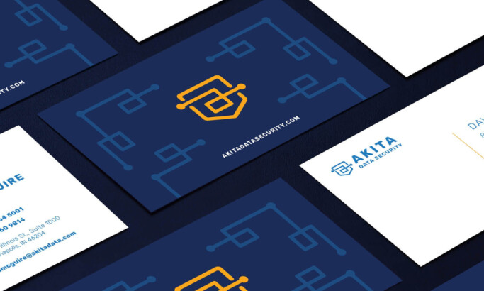 Business cards for Akita Data Security with circuit-style shield logo.