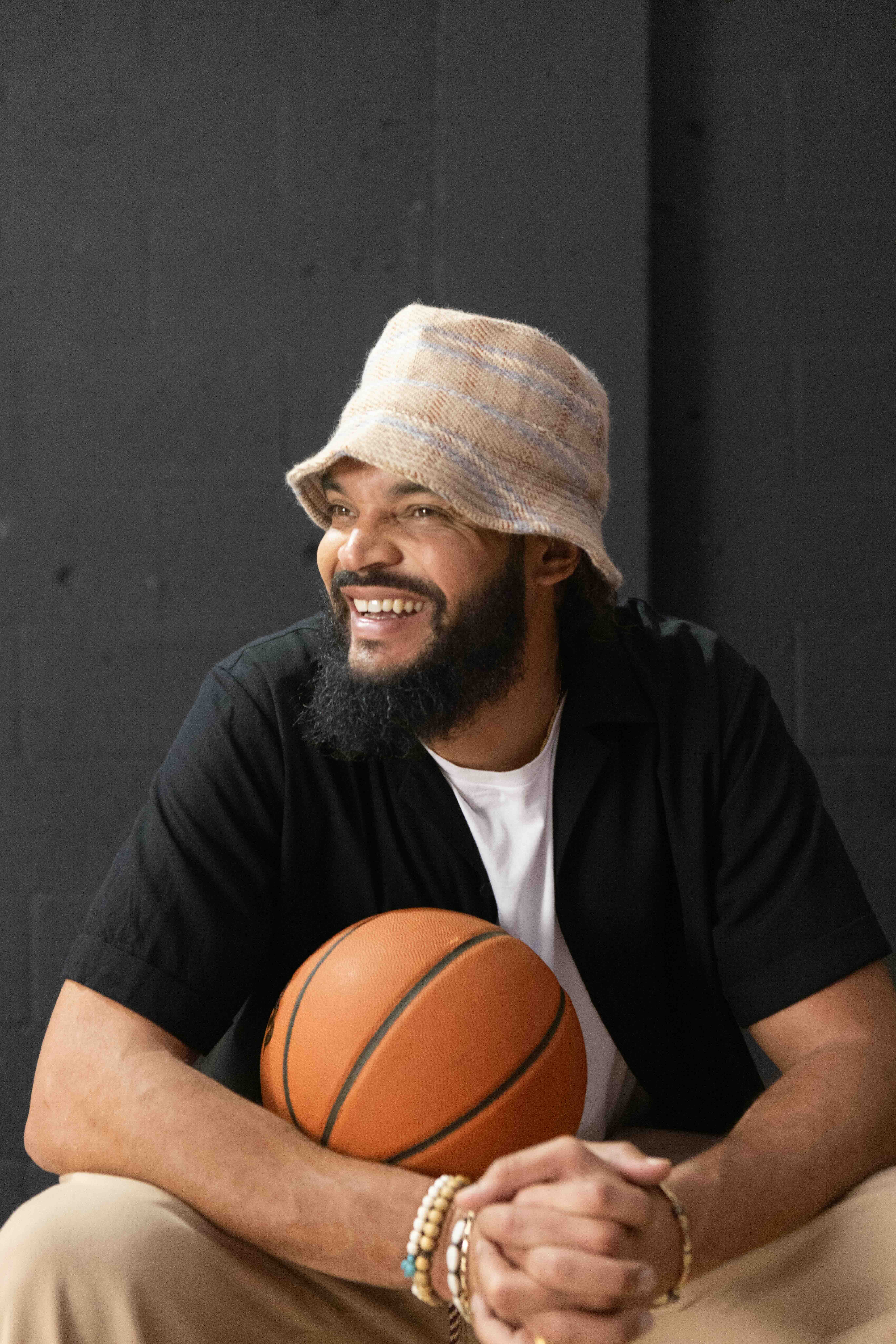 Joakim Noah holding a basketball in an ad for BetterHelp