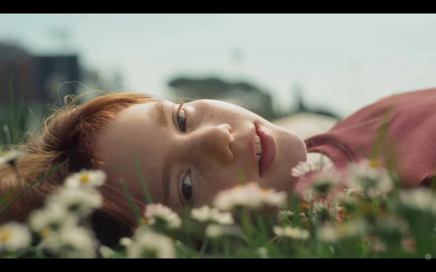 A young girl narrates over footage of people living full lives before smartphones existed.