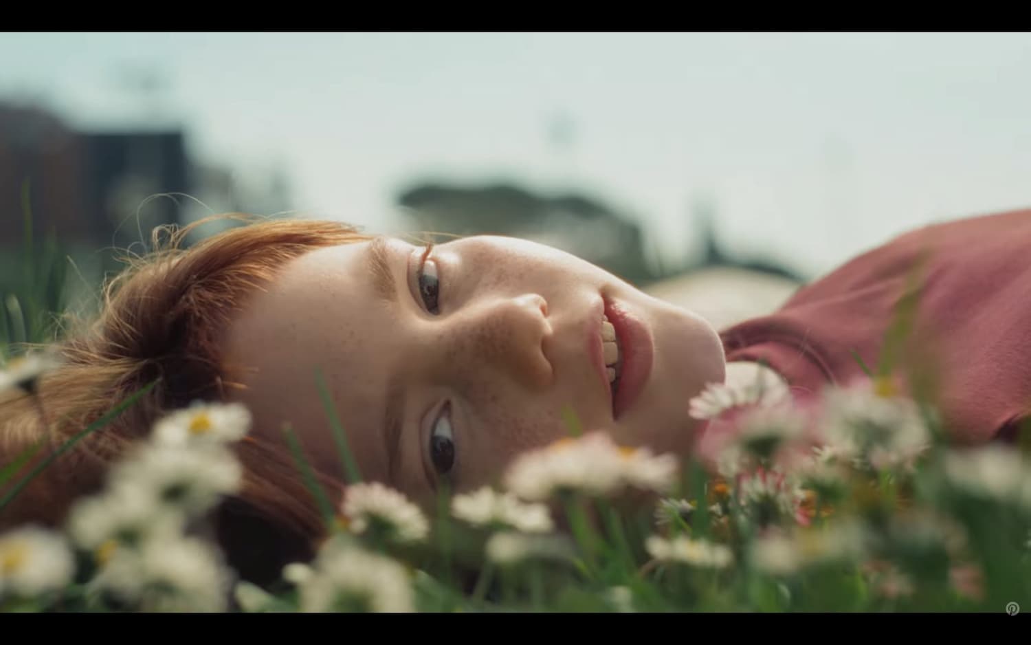 A young girl narrates over footage of people living full lives before smartphones existed.