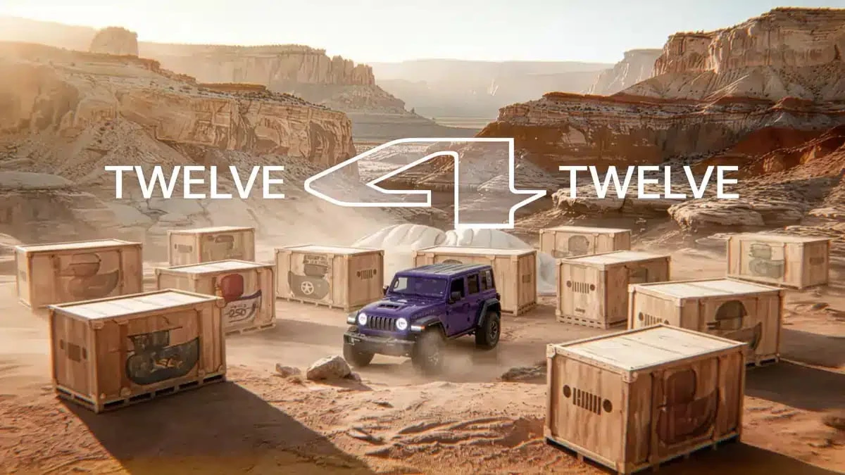 Jeep Wrangler driving through a desert canyon surrounded by wooden crates hinting at upcoming limited-edition drops in the Twelve 4 Twelve campaign
