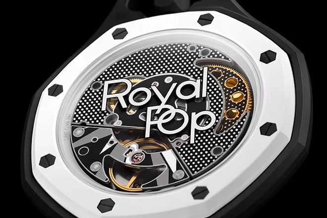 ap-x-swatch-royal-pop-black Royal Pop dial showing AP bezel and skeletonized movement.