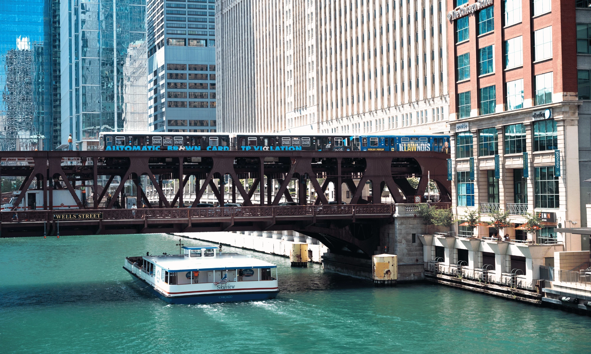 DUDE Wipes Wraps Chicago’s Brown Line for ‘Brown Card’ Campaign A DUDE Wipes-wrapped Brown Line train crosses Chicago’s Wells Street Bridge above the river.